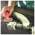 UPPFYLLD Vegetable cutters, set of 2, bright yellow/bright orange - Image 3