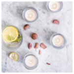 BUKETTAPEL Scented tealight, bergamot & cedarwood/pale green, 3.5 hr - Image 3