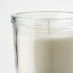 JÄMLIK Scented candle in glass, Vanilla/light beige, 20 hr - Image 7