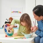 UNDERHÅLLA Educational wooden clock, multicolour, 25 cm - Image 2