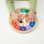 UNDERHÅLLA Educational wooden clock, multicolour, 25 cm - Image 3