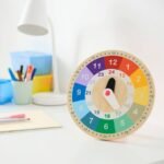 UNDERHÅLLA Educational wooden clock, multicolour, 25 cm - Image 4